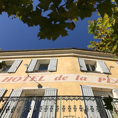 Bar Hotel De La Place Mezel Exterior photo